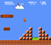 screenshot of Mario jumping over adjacent pyramids